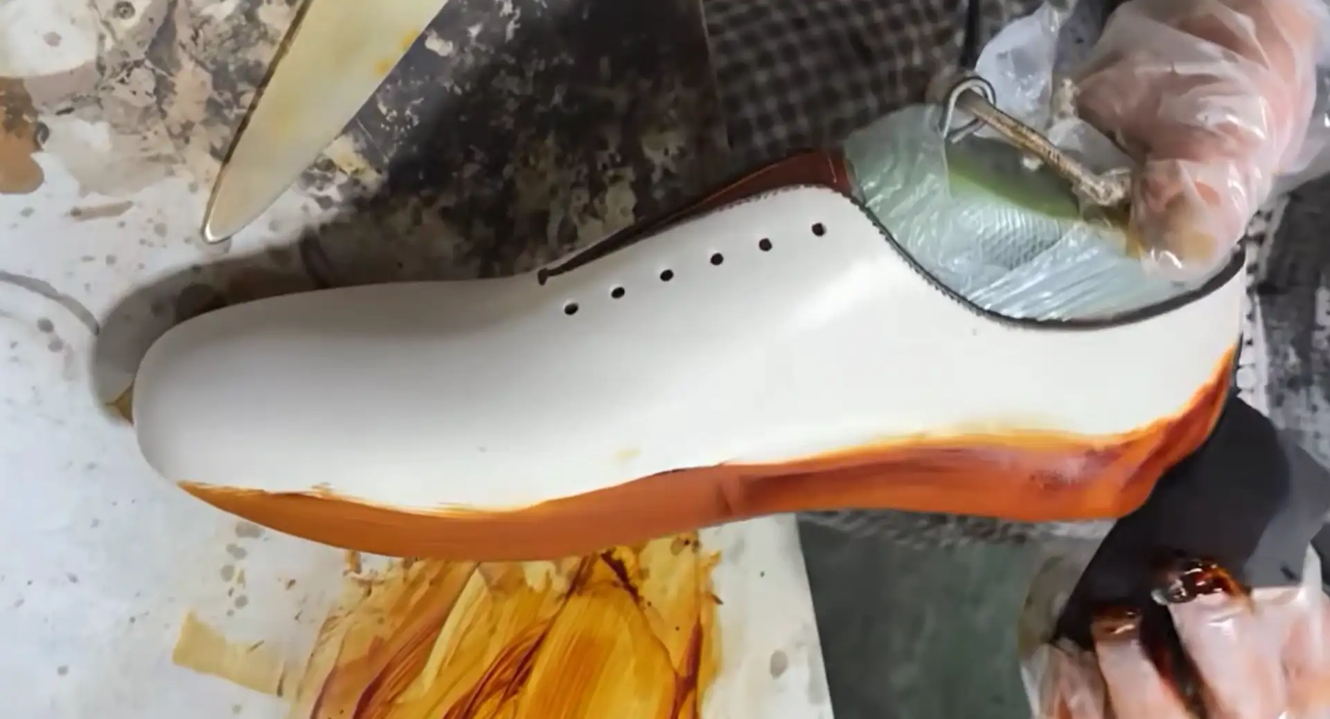 Luxury hand-painted shoe manufacturer